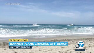 Horrified beachgoers watch as plane crashes into the ocean at Huntington Beach | ABC7