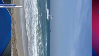 Watch: Plane crashes into ocean in Huntington Beach