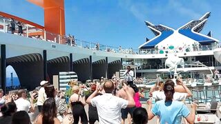 Celebrity Beyond Edge-Class Ship Poolside Dance Class With Cruise Director Giuseppe Moschella