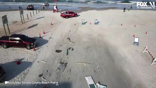 WILD Daytona Beach crash | See moment vehicle drives across beach and crashes into ocean