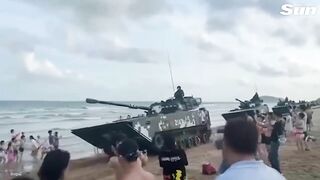 China vows to ‘fight to death’ & masses tanks on beaches for Taiwan strike