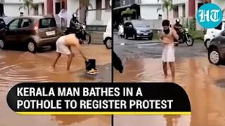 Kerala man bathes in pothole, performs yoga in front of MLA; Bengaluru-style protest In Malappuram