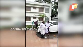 Bath in potholes, Yoga in front of MLA: Watch Kerala man's unique protest against poor roads