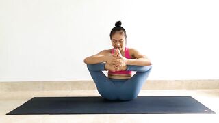 Yoga at home stretching legs