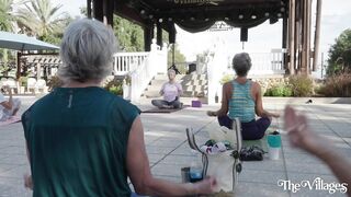 Practicing Yoga on the Square in The Villages, FL