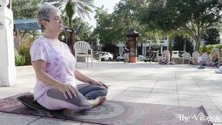 Practicing Yoga on the Square in The Villages, FL