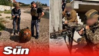Ukrainian army destroys drifting sea mine with explosives on beach