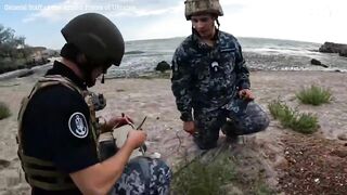 Ukrainian army destroys drifting sea mine with explosives on beach