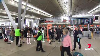 Travel plans thrown into chaos at Sydney Airport | 7NEWS