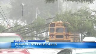 Steeple falls off Virginia Beach church, wedged against apartment complex