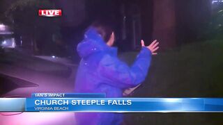 Steeple falls off Virginia Beach church, wedged against apartment complex