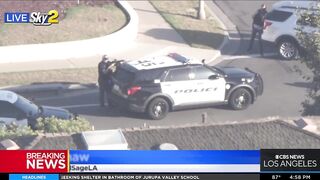 Carjacking suspect barricaded in Newport Beach home