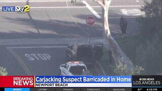 Carjacking suspect barricaded in Newport Beach home