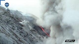 Drone captures Lava stretching to sea as Stromboli volcano eruption unleashes plume of smoke