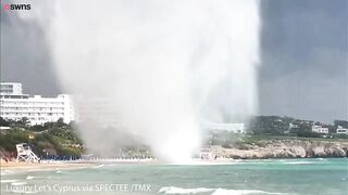 Huge waterspout wreaks havoc on tourist hotspot beach in Cyprus | SWNS