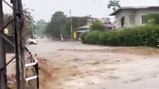 A destructive stream sweeps away everything in its path! Flooding in Maraval, Trinidad
