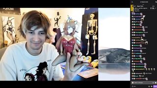 xQc showing his Anime figurine