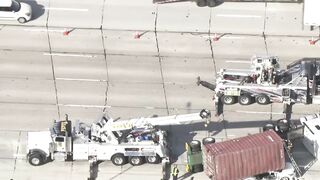 Big rig overturns on car on 405 Freeway in Seal Beach