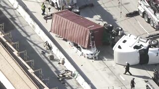 Big rig overturns on car on 405 Freeway in Seal Beach