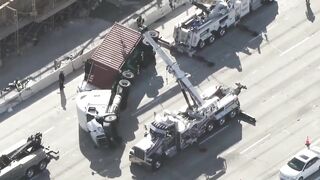 Big rig overturns on car on 405 Freeway in Seal Beach