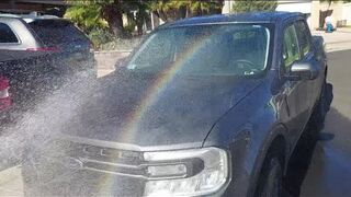 Ford Maverick rainbow and RC cars at the beach