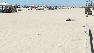 Ford Maverick rainbow and RC cars at the beach