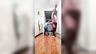 Cute Toddler Practices Yoga With Mother - 1377852