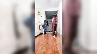 Cute Toddler Practices Yoga With Mother - 1377852