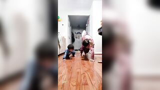 Cute Toddler Practices Yoga With Mother - 1377852