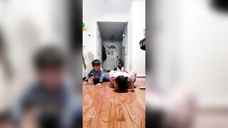 Cute Toddler Practices Yoga With Mother - 1377852