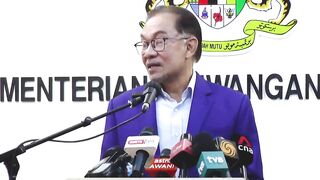 Don't challenge me, Anwar tells Muhyiddin