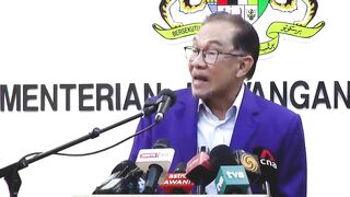 Don't challenge me, Anwar tells Muhyiddin