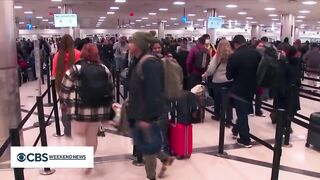 Brutal winter weather conditions force millions of Americans to delay, cancel holiday travel plans