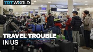 Travel misery grinds on as US digs out from deadly superstorm