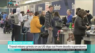 Travel misery grinds on as US digs out from deadly superstorm