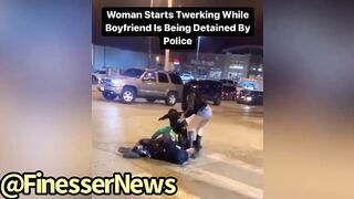 Girl Starts To TWERK On Officer While Her Man Is Getting Detained On New Years LOL????