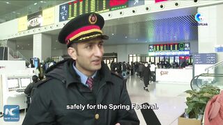 GLOBALink | Pakistani youth experiences Spring Festival travel rush as railway worker