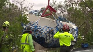 Helicopter used to remove boats from mangroves on Fort Myers Beach