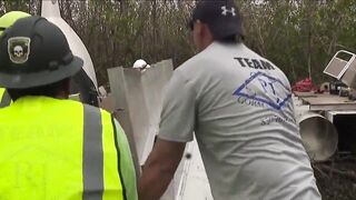 Helicopter used to remove boats from mangroves on Fort Myers Beach