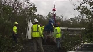 Helicopter used to remove boats from mangroves on Fort Myers Beach