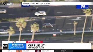 Pursuit suspect fleeing from police in Huntington Beach