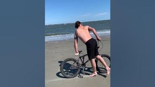 Cyclist Moonwalks on the Beach || ViralHog