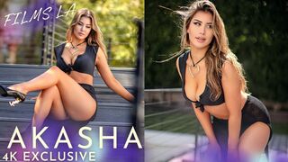 Swimsuit Model Akasha Puts on a Show in Black Bikini With Skirt