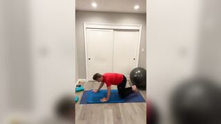 7- yr old runner does early morning yoga stretching before a run