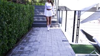 Model Akasha Showing Off New Tennis Skirt