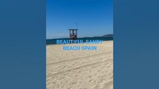 White sandy beach and blue sky