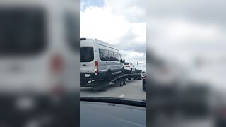 VERY Small pickup truck pulling heavy weight vehicles on trailer