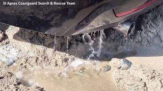 BMW washed out to sea on Cornish beach rescued by coastguard