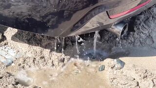 BMW washed out to sea on Cornish beach rescued by coastguard