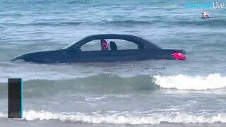 BMW washed out to sea after parking on Cornish beach